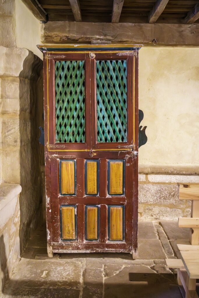 Confessional in the Church of San Andrés in Gama, a town in the province of Palencia, Castilla y León, Spain, belonging to the municipality of Aguilar de Campoo.